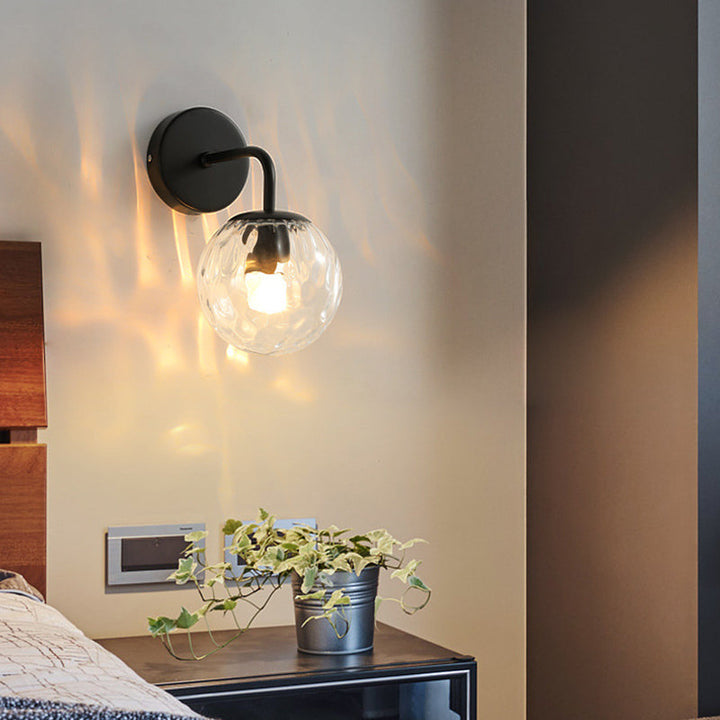Ball Shaped Wall Lamp Minimalist Clear Rippling Glass 1-Light Bedroom Wall Mounted Lighting with Bent Arm in Black/Gold