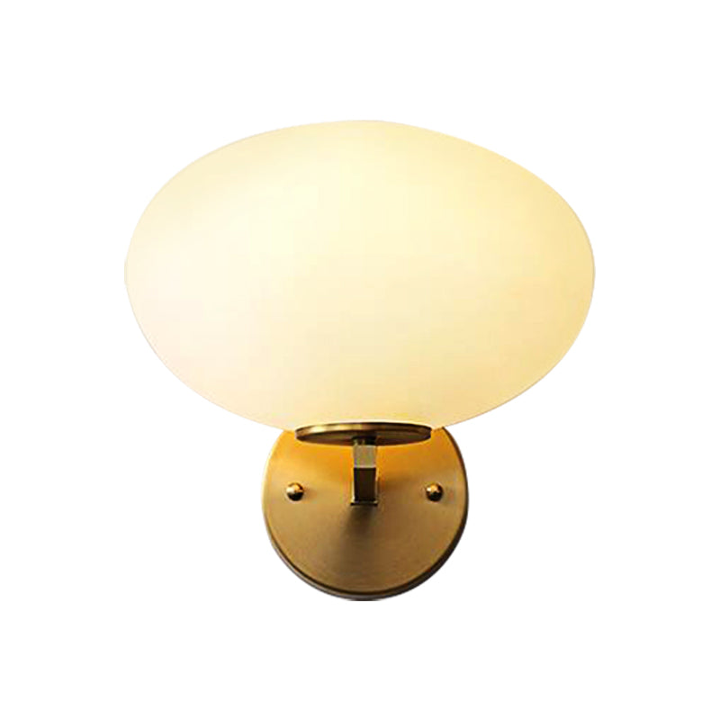 Milk Glass Oval Wall Mount Lamp Modern 1 Light Bedside Wall Sconce Light in Brass