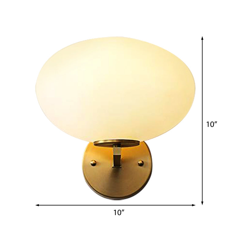Milk Glass Oval Wall Mount Lamp Modern 1 Light Bedside Wall Sconce Light in Brass