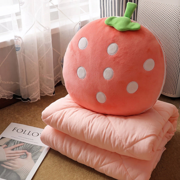 Plush pillow in fruity design