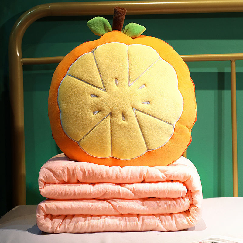 Plush pillow in carrot shape