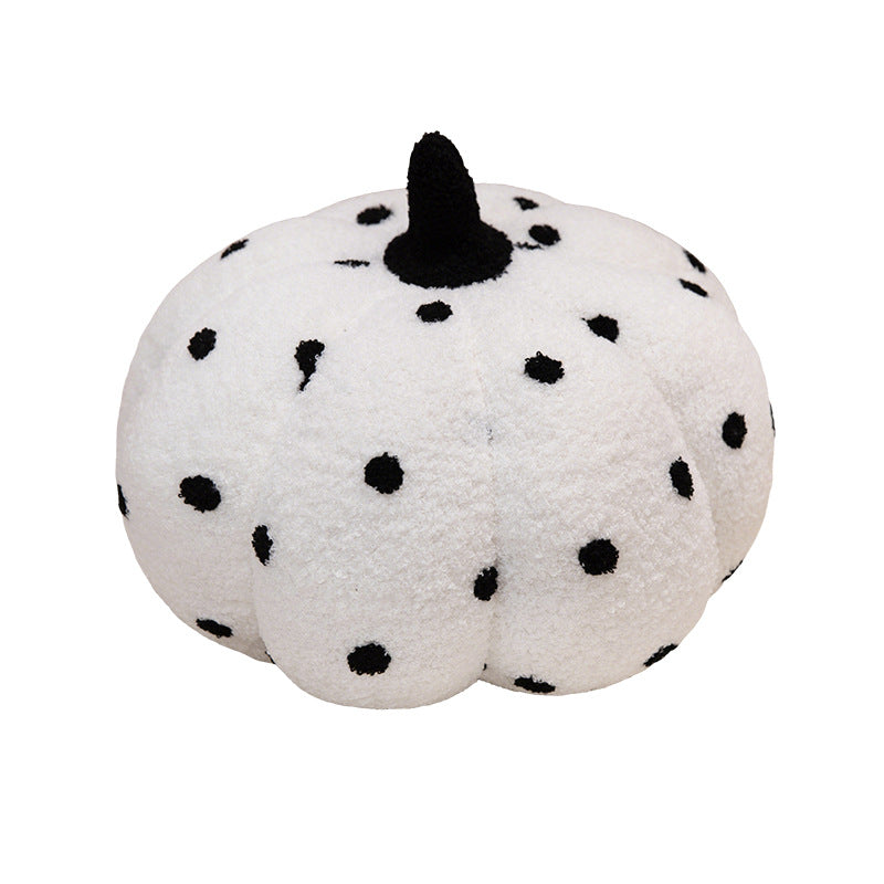 Plush cushion in pumpkin design