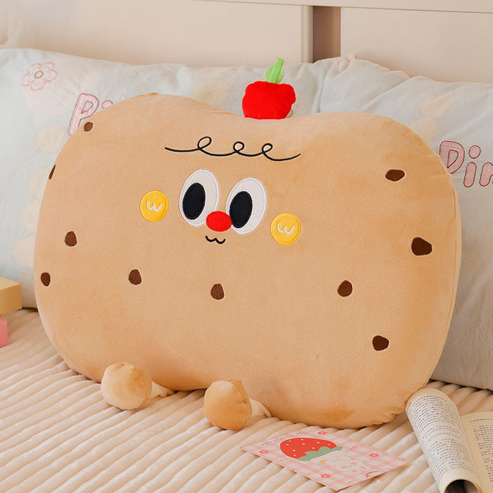 Plush pillow in cookie shape with cute face