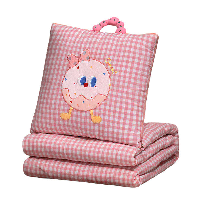 Plush cushion with candy motif