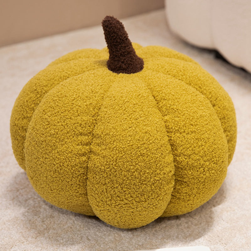 Plush cushion in pumpkin design