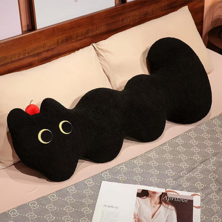 Plush cushion in cat shape
