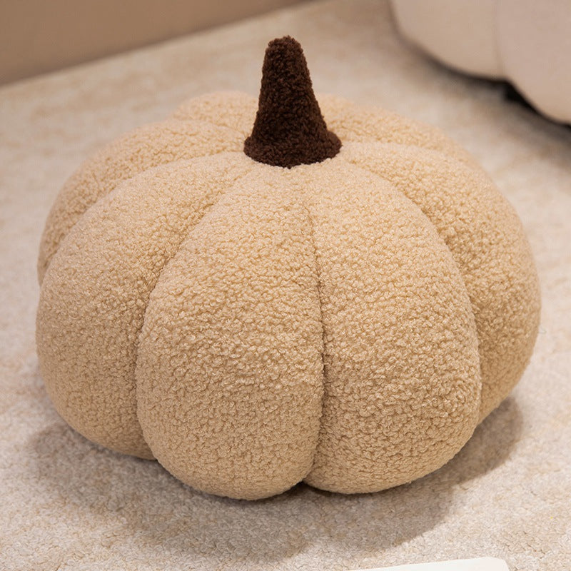 Plush cushion in pumpkin design