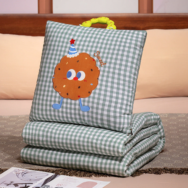 Plush cushion with candy motif