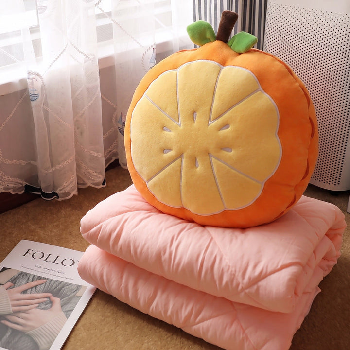Plush pillow in fruity design