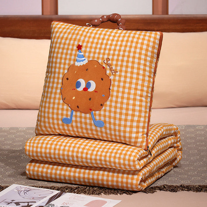 Plush cushion with candy motif