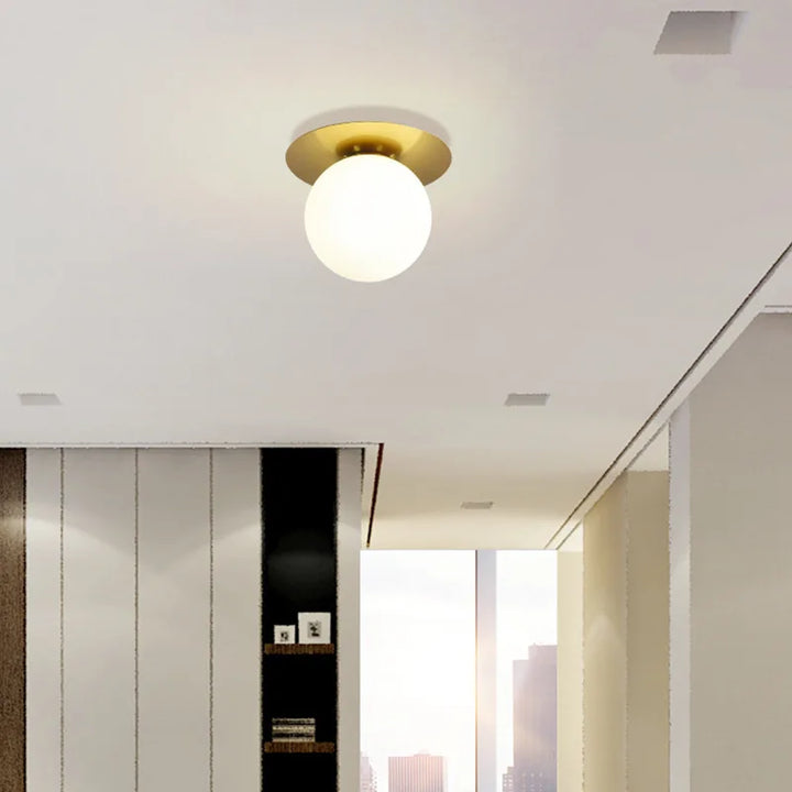 Nordic LED Ceiling Light – Simple Bedroom, Corridor, and Living Room Light with Acrylic Ball and Gold & Black Iron G9 Lamp