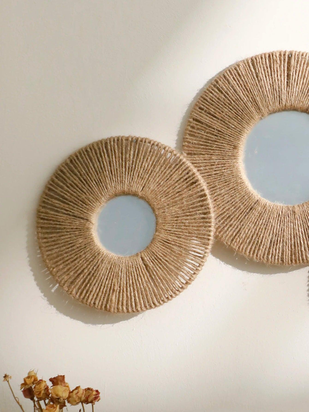 Round decorative wall mirror in boho style