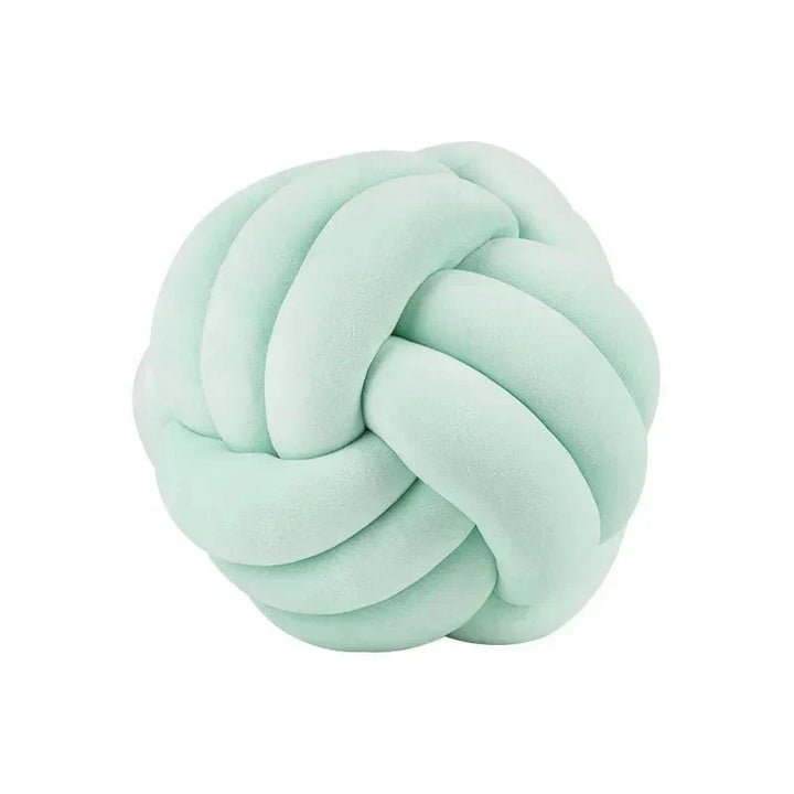 Decorative, soft cushion with knotted ball in suede look